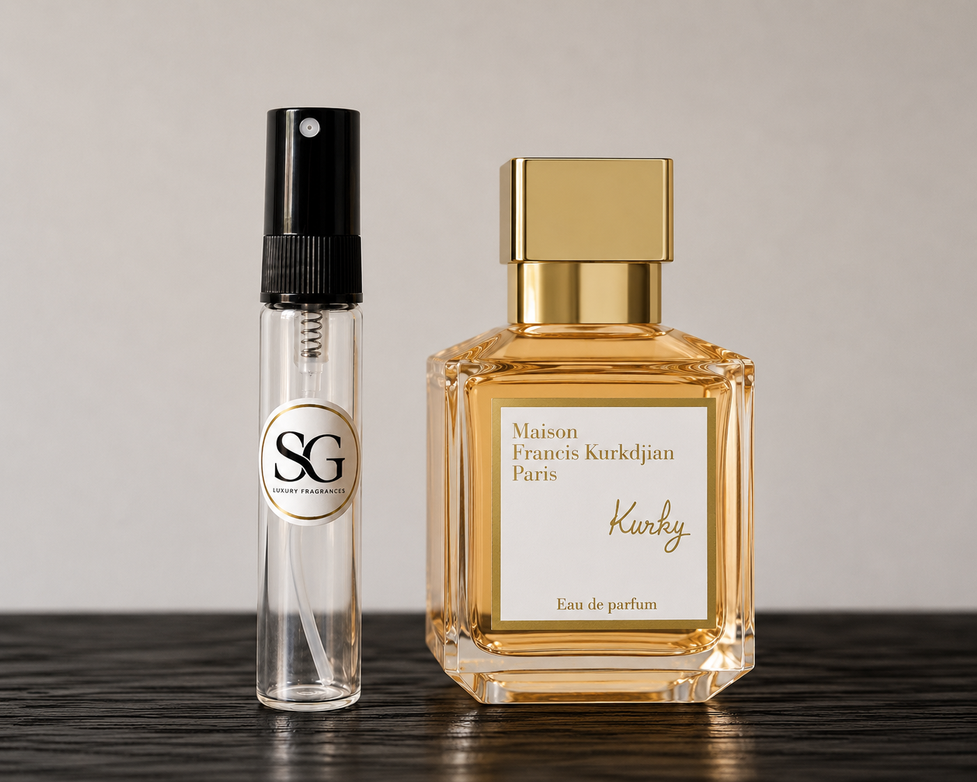 Two perfume bottles, one clear with black cap and one gold, on a dark surface.